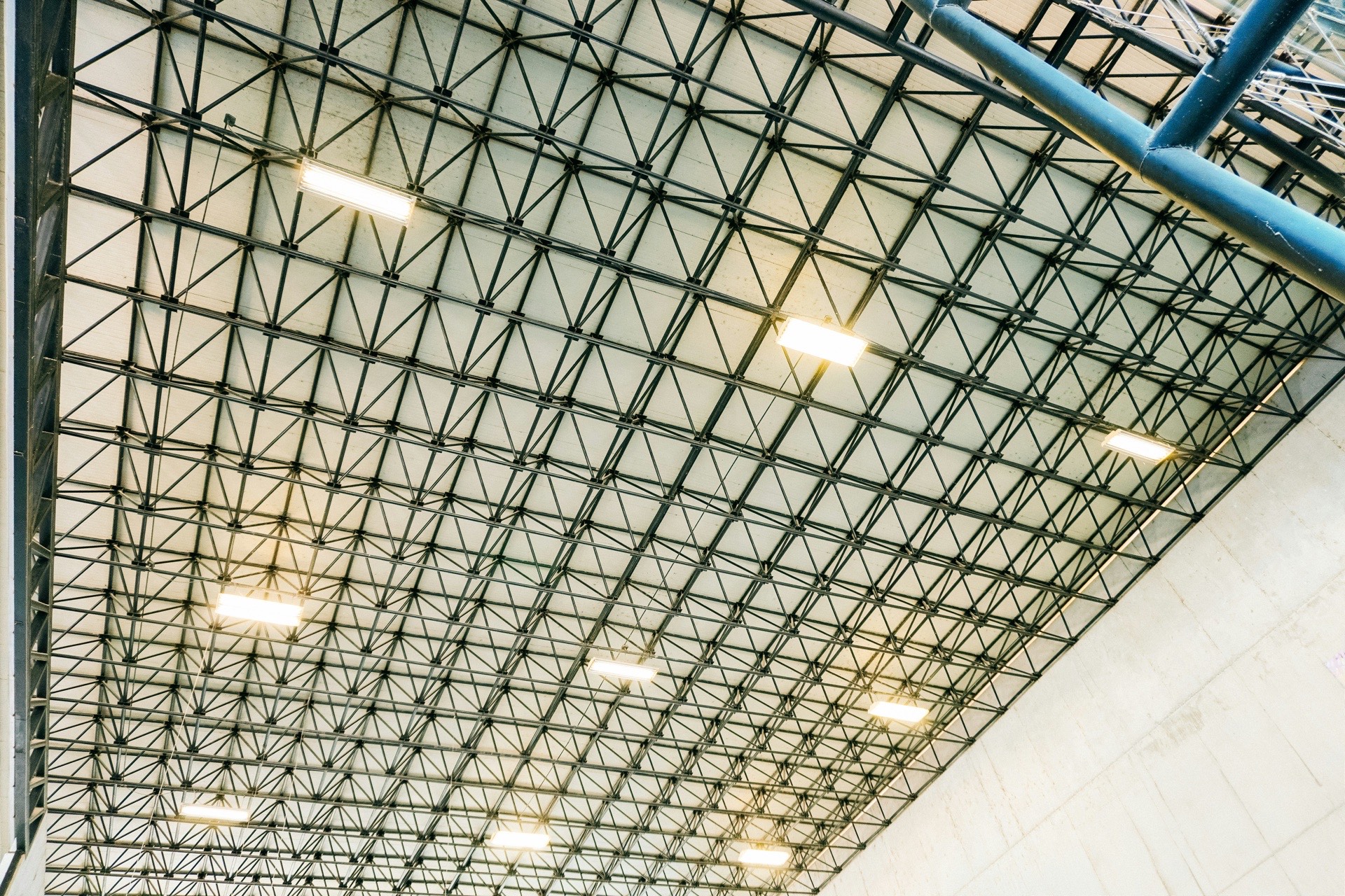 Bright LED warehouse interior — before/after comparison
