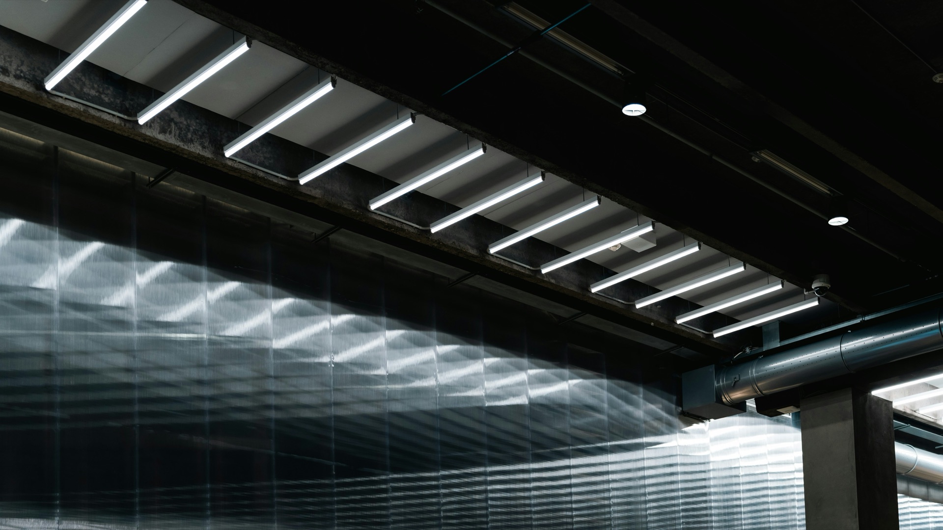 Modern industrial ceiling with linear LED panels